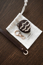 The Pinecone · 01 (w/strap)
