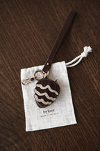 The Pinecone · 01 (w/strap)